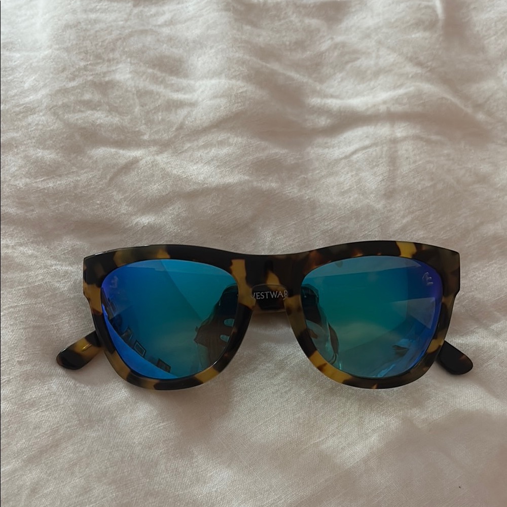 Westward Leaning Tortoise Shell Sunglasses with Blue Lenses